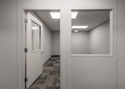 Gray office with window and door